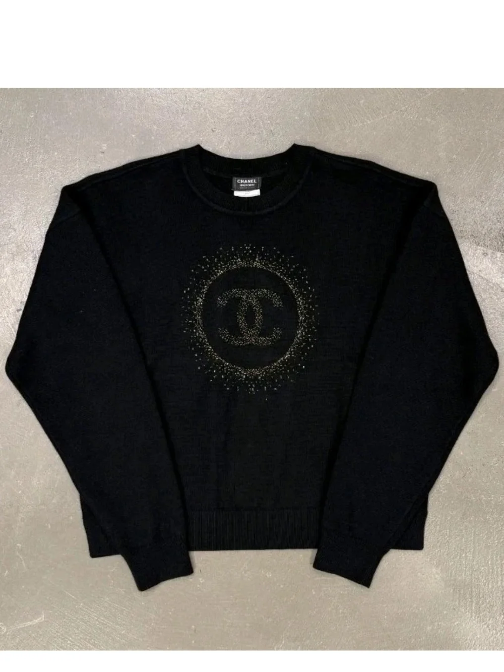 CHANEL Uniform Black Crewneck Sweater with Gold CC Sunburst